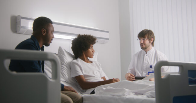 Doctor reports test results using tablet computer